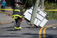 Utility pole containing transformer toppled in Rossville section of Staten Island; hundreds without power