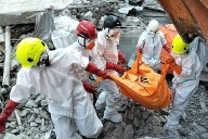 Death toll in Indonesian school collapse rises to 61 as more bodies are recovered