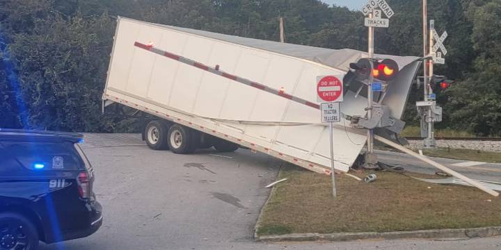 Semitrailer collides with train in Conyers, police say