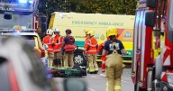 At least two killed in stabbing and car ramming attack on Yom Kippur at synagogue in Manchester, UK police say