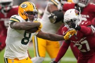 Josh Jacobs runs for 2 TDs, Micah Parsons has 3 sacks as Packers rally past Cardinals 27