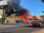 Vacant hotel erupts into flames near Interstate 35, UT campus