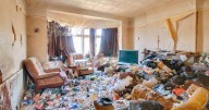 Three-bed home buried in piles of rubbish goes on sale for £180,000