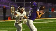 Watertown quarterback Markus Pitkin proves he's a triple threat