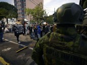 Rock-throwing mob ambushes Ecuador president’s motorcade