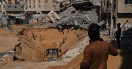 Israel says transfer of humanitarian aid into Gaza is halted for now