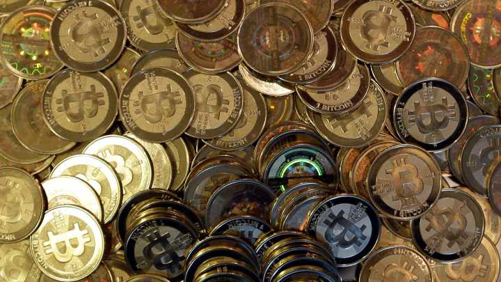 U.S. charges Cambodian tycoon in massive alleged cryptocurrency scam : NPR