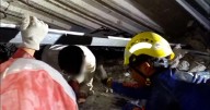 Frantic rush to reach scores of students missing for days after boarding school collapse in Indonesia