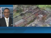 Worshippers gather for parking lot service after the church was destroyed by fire