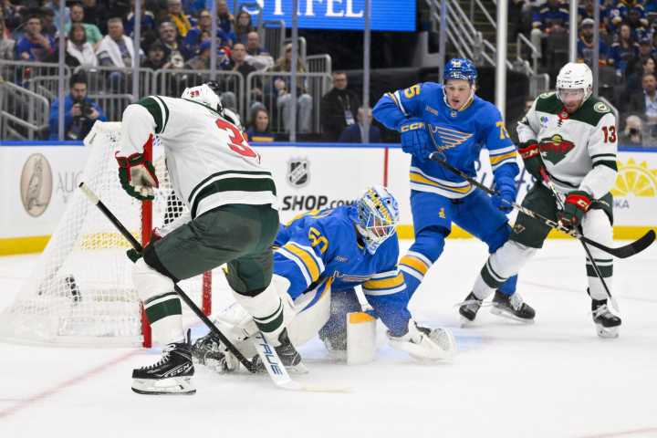 Wild deliver Hartman attack to Blues in opener