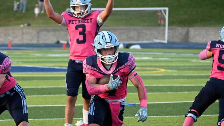 PHOTOS: Petoskey football fights harder longer vs. Cadillac