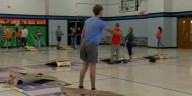 Cornhole teams raise money for Evansville non