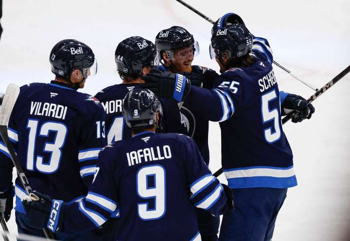 Scheifele makes history as Jets drop division rivals