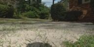 Columbia woman calls for cleanup after construction leaves yard covered in sand
