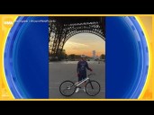 Cyclist bikes up Eiffel Tower
