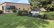 Fabtex merges with Quiltcraft; new Threadwell sign marks Danville facility