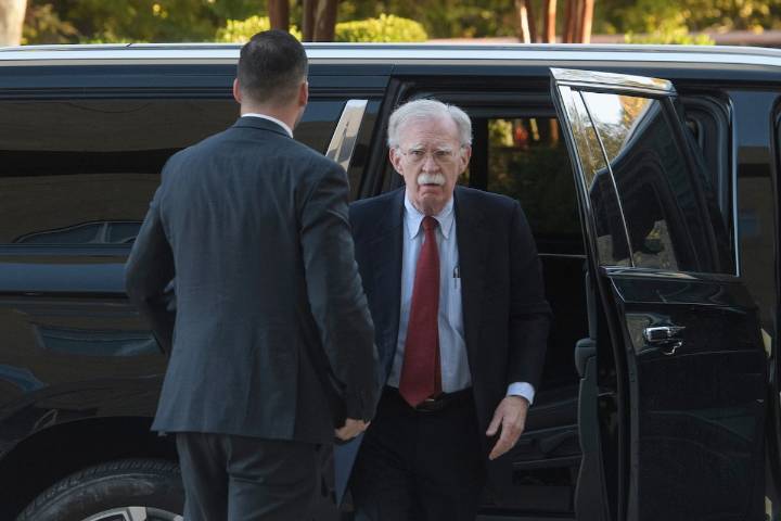 Former Trump adviser John Bolton surrenders following charges of mishandling classified information