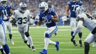 Jonathan Taylor runs for 3 touchdowns and Daniel Jones throws for 2 as Colts rout Raiders 40