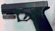 Man arrested after firearms, drugs found in car in North County