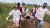 No road, Telangana 108 ambulance team carries pregnant Gotti Koya woman