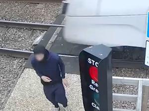 Camera catches teen playing ‘chicken’ with high