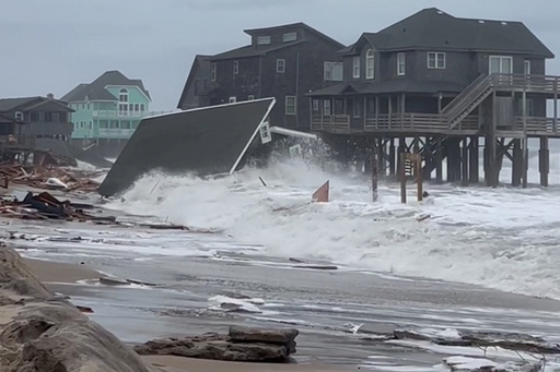 Five homes collapse into the surf of the Outer Banks as hurricanes rumble in Atlantic