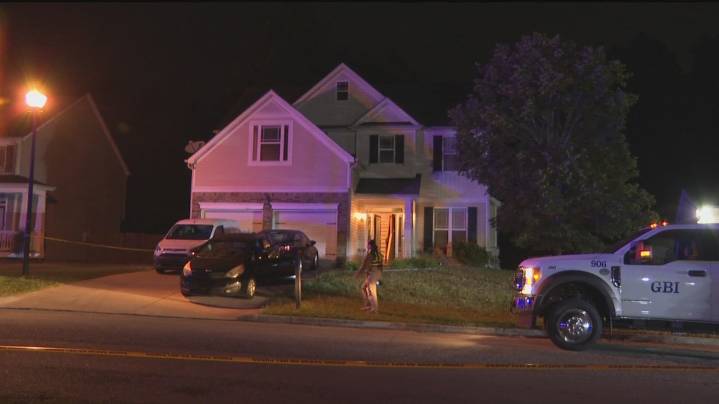 Woman fatally shot outside her home in Douglasville, police fire at suspect