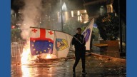 Georgia's prime minister says protesters want to topple his government and vows a further crackdown