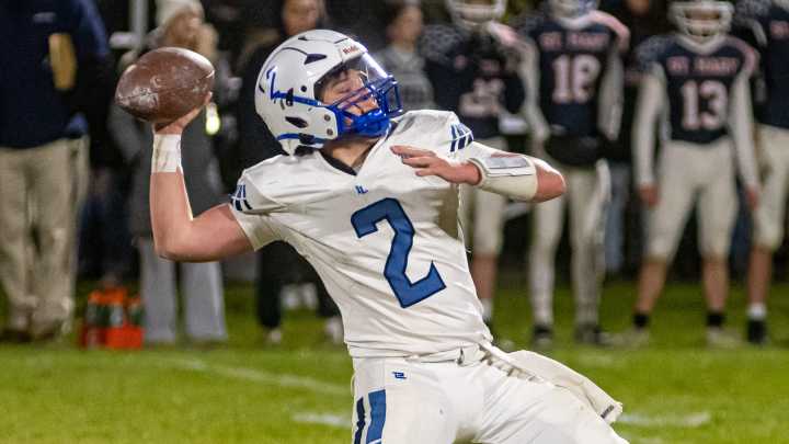 Who is Inland Lakes football's first-round playoff opponent?