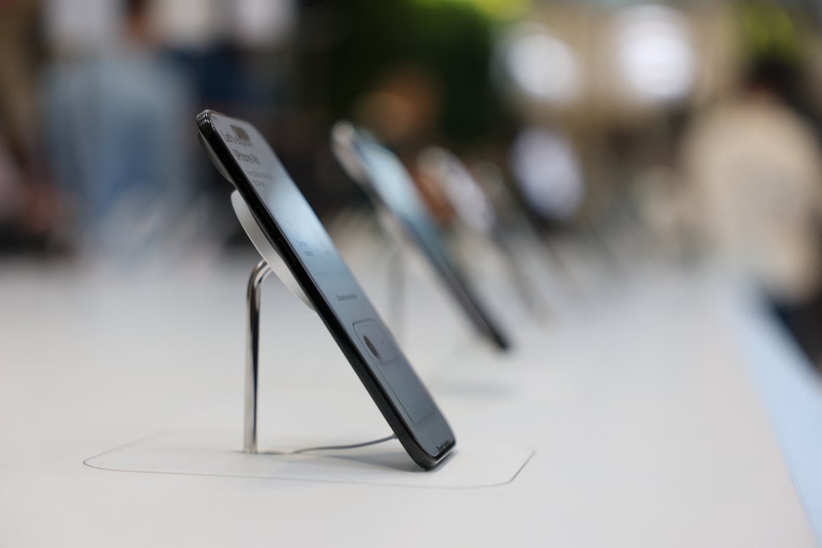 Apple becomes third Big Tech company to top $4 trillion in market value after luring customers back with latest iPhones