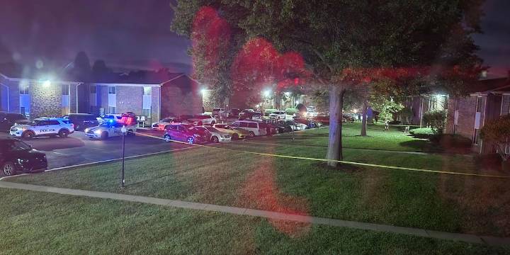 Police with guns drawn at Eastland Apartments, neighbor says