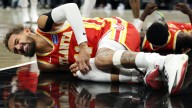 Trae Young suffers knee injury in Hawks' game vs. Nets
