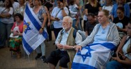 The Latest: Israel prepares to welcome home hostages from Gaza