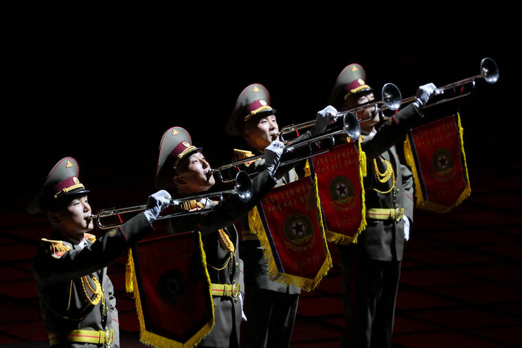 North Korea holds military parade, shows off new intercontinental missile