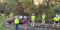 Service train hits car in Meridian Twp., part of Hagadorn Road closed