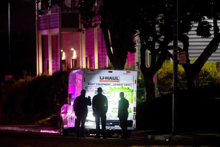 Officers shoot truck driver who backed into Coast Guard base