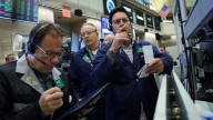 Stocks rally and Dow closes above 47,000 for first time after cooler