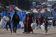 Top officials from US and Qatar join talks aimed at brokering peace in Gaza