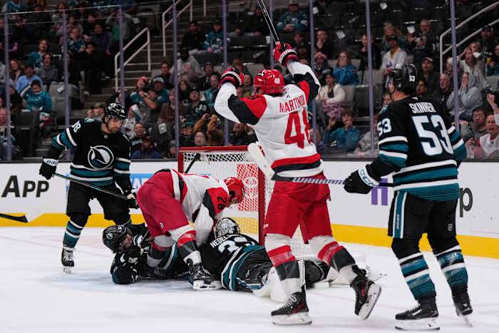 Carrier, Robinson score late in 2nd period and Hurricanes beat Sharks 5