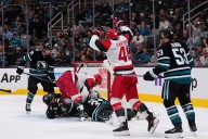 Carrier, Robinson score late in 2nd period and Hurricanes beat Sharks 5