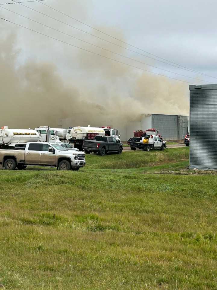 Crews respond to warehouse on fire in Hoople, ND