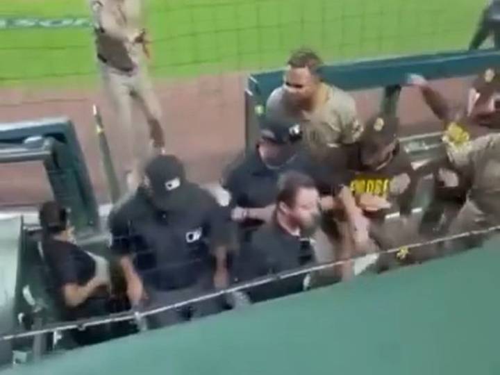 Padres confront umps in wild scene after controversial call