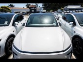 Tesla Profit Plunges More Than Expected