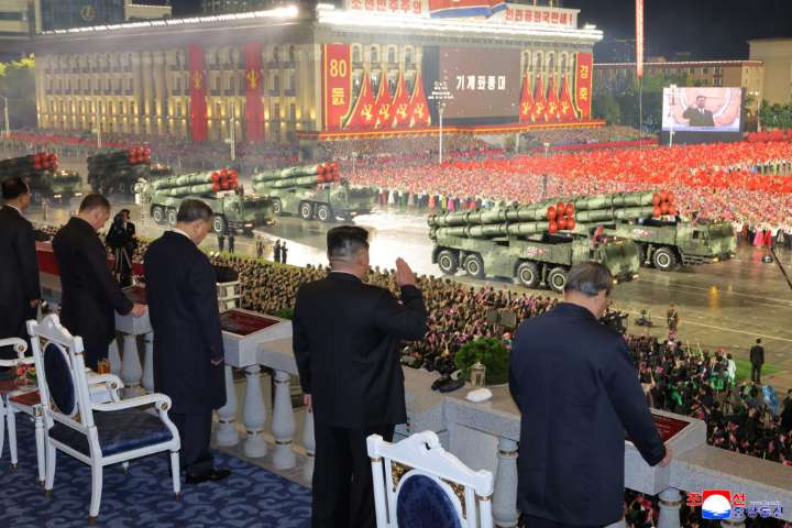 North Korea displays new long-range missile at military parade celebrating Kim Jong Un