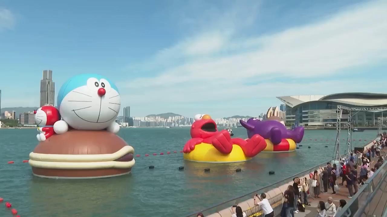 Giant inflatable cartoons descend on Hong Kong’s Victoria Harbor