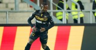 Togo soccer player breaks neck after colliding with ad board during match