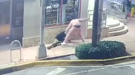 Surveillance video captures man savagely beating, robbing tourist in Miami Beach; suspect in custody