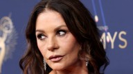Catherine Zeta Jones, 56, rocks slinky red sequin dress to tease new femme fatale project