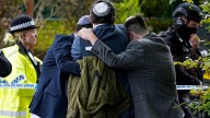Man kills 2, wounds 4 in car ramming, stabbing at English synagogue