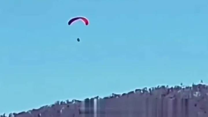 Shock moment migrant takes to the skies to PARAGLIDE into Europe over heavily fortified border